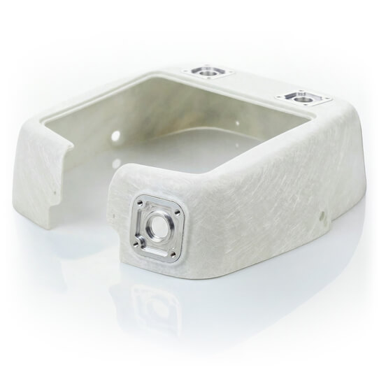 Das Bild zeigt ein Kunststoffgehäuse mit metallischen Befestigungselementen.